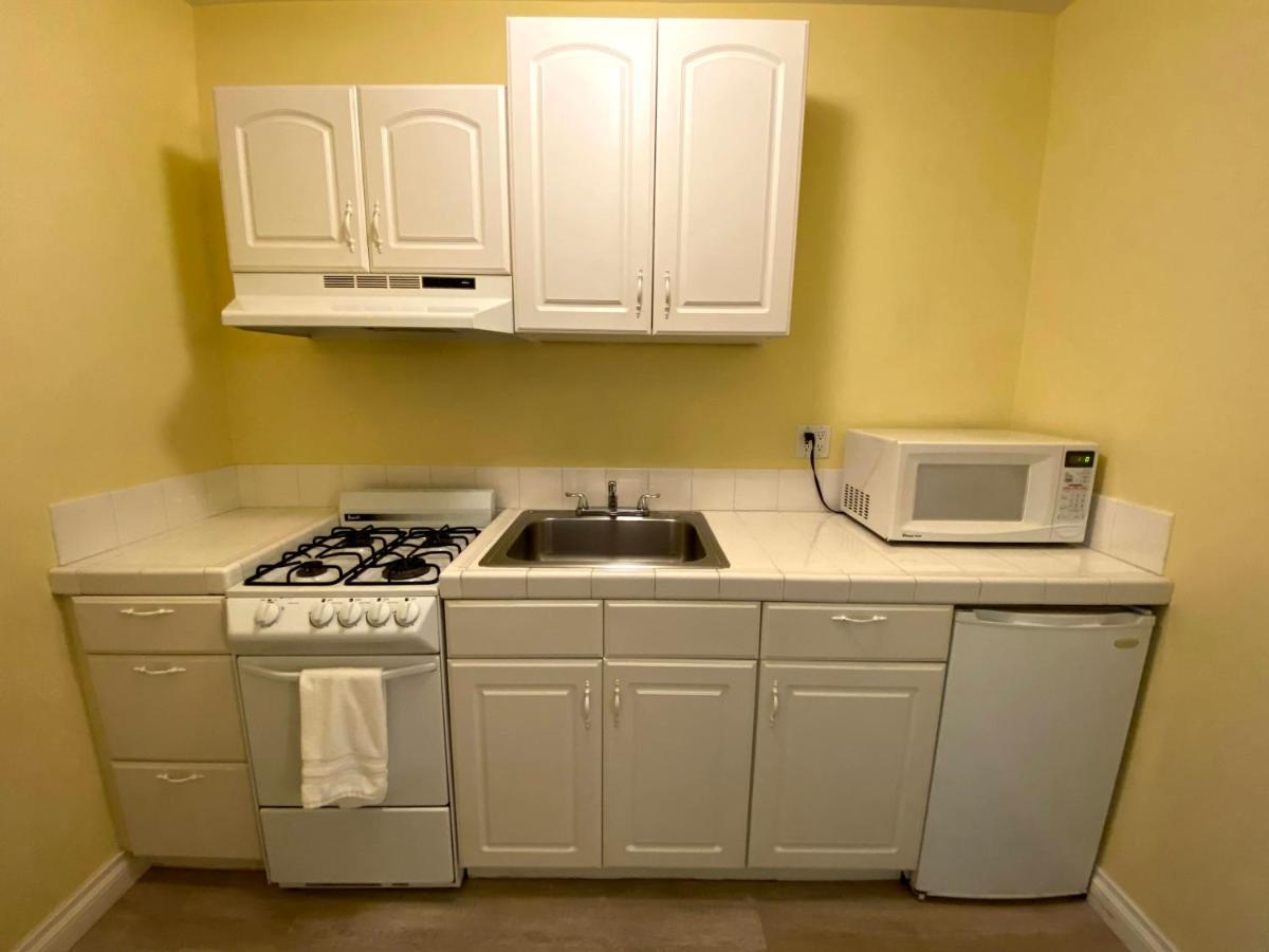 Quarto Executivo com 2 Camas Queen-Size e Cozinha