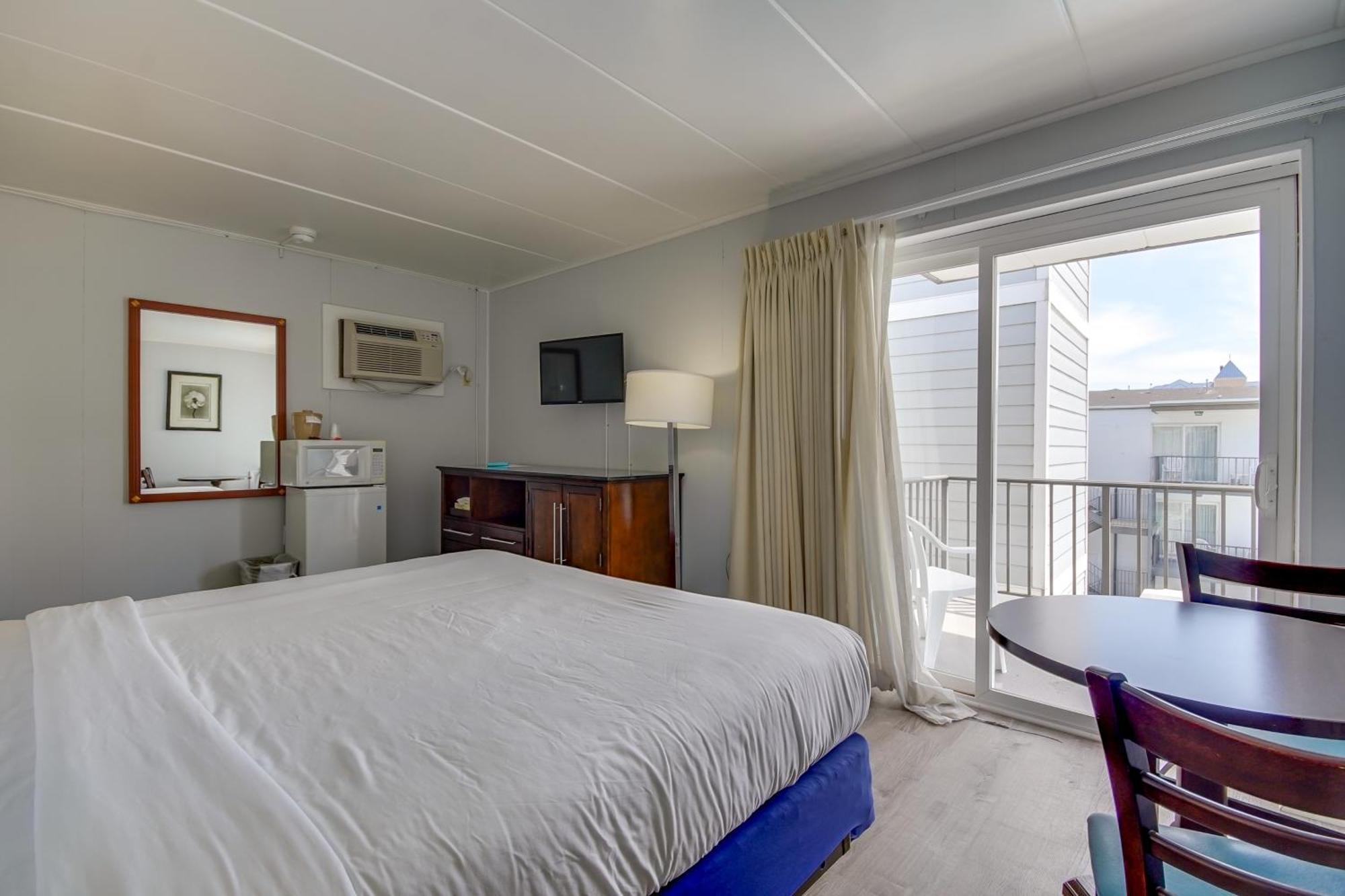 King Room One King Bed Balcony Pool View