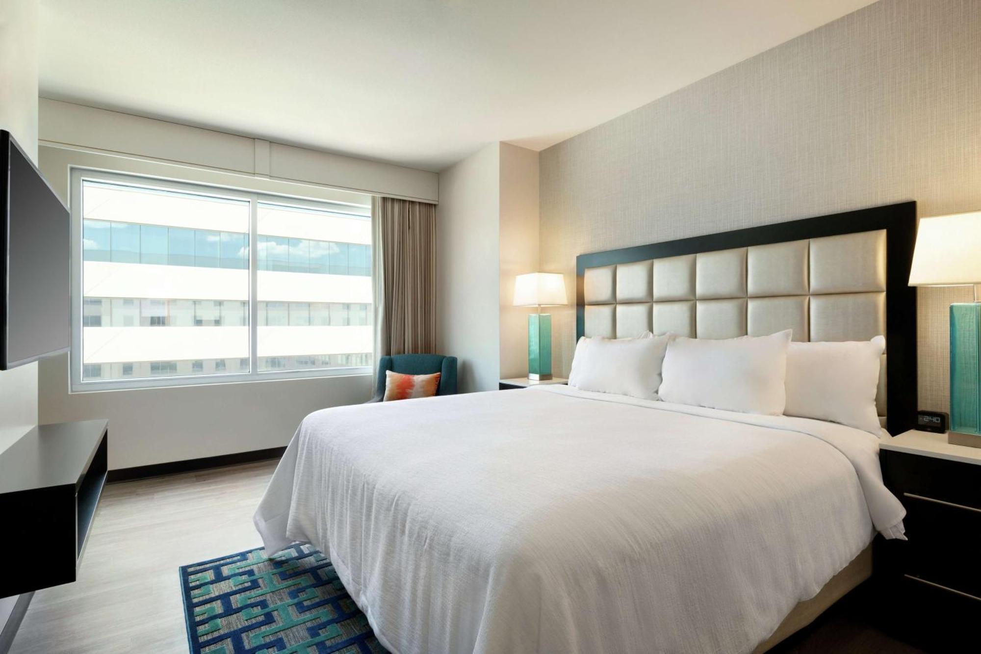 Two-Room King Suite Mobility or Hearing Accessible Roll Shower