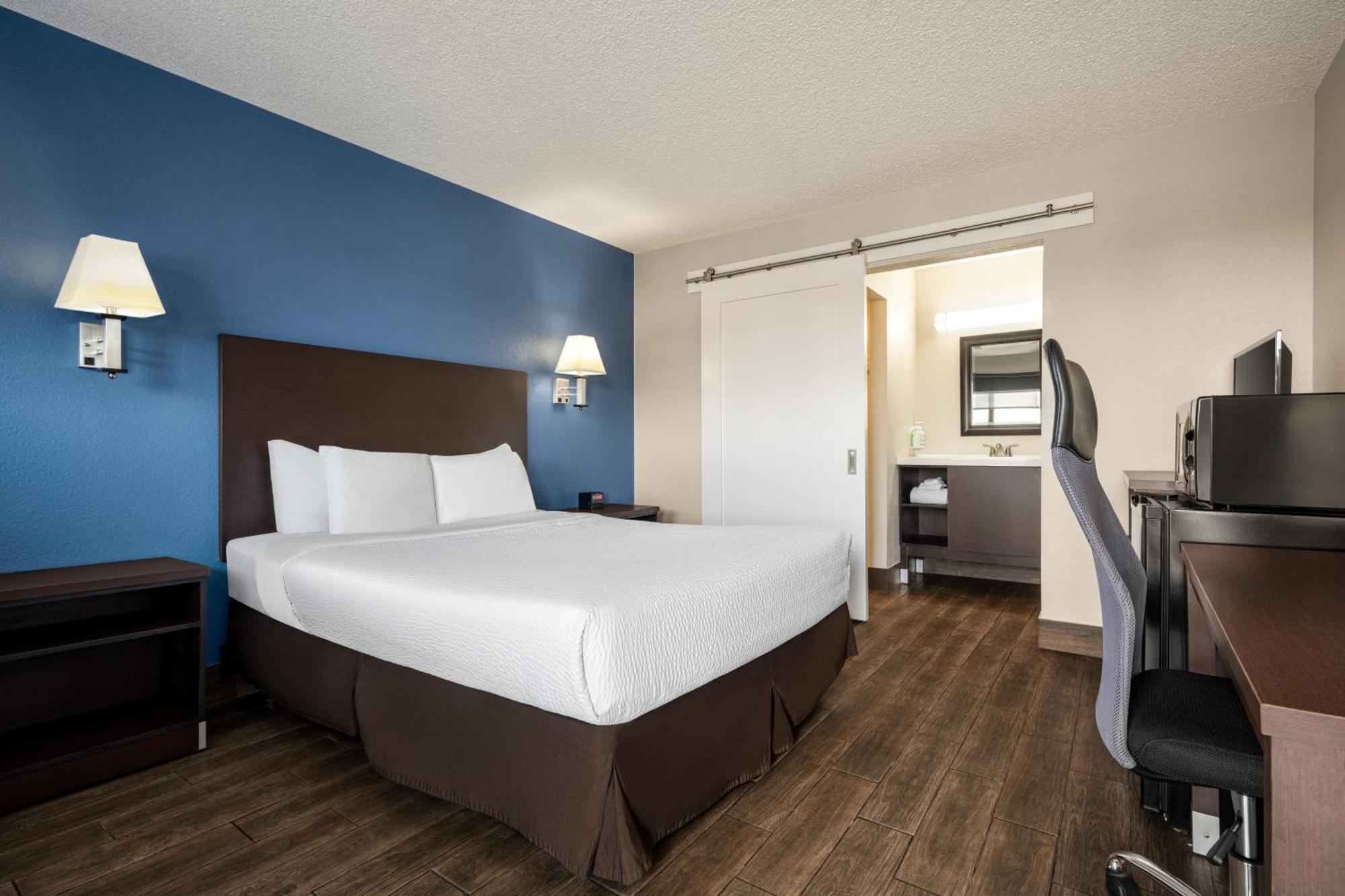 Chambre Lit Queen-Size Deluxe - Non-Fumeurs