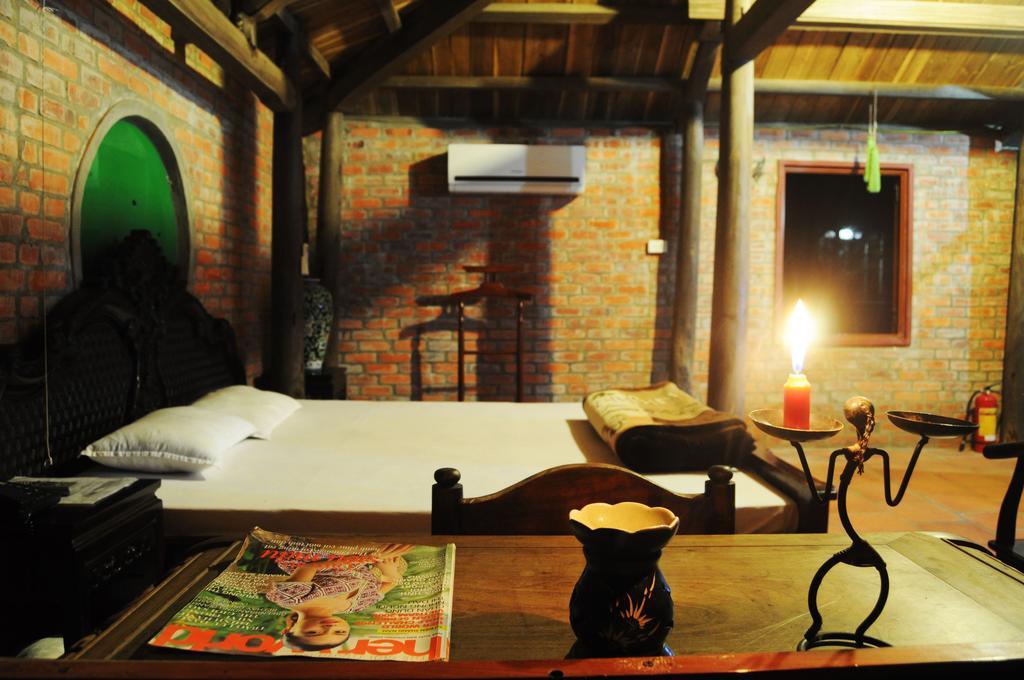 Suite con cama grande y cocina americana