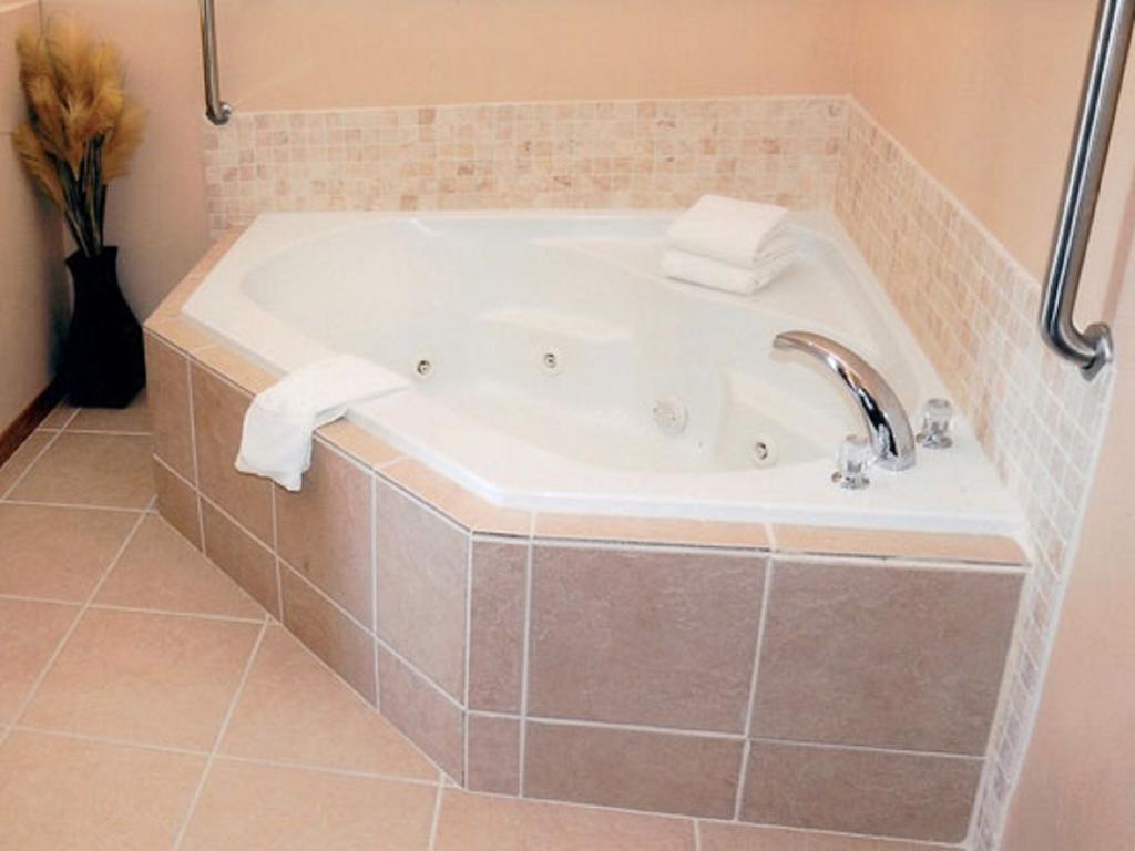 Suite con bañera de hidromasaje - Cama extragrande