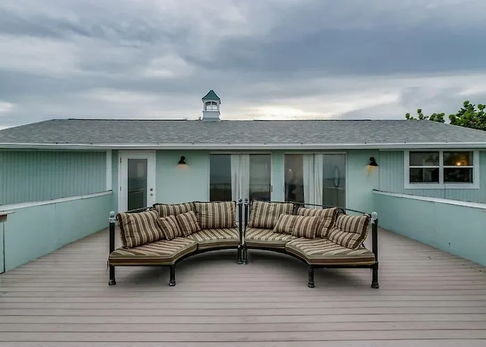 Oceanfront Elegance: 6BR Beach House with Hot Tub & Views