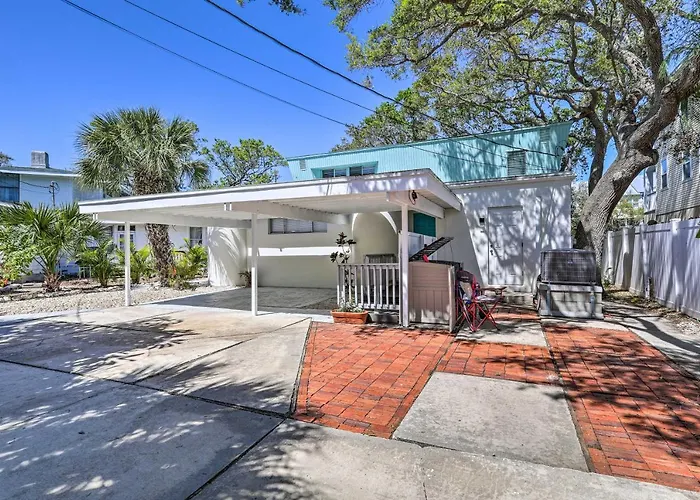 Tropical Waterfront Home: Central Location!