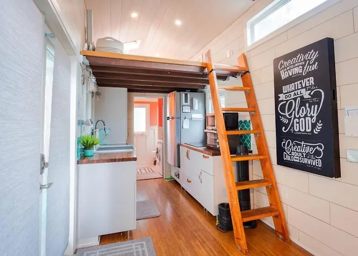 Lofted Bedroom Teal Tiny Home With Creek Views