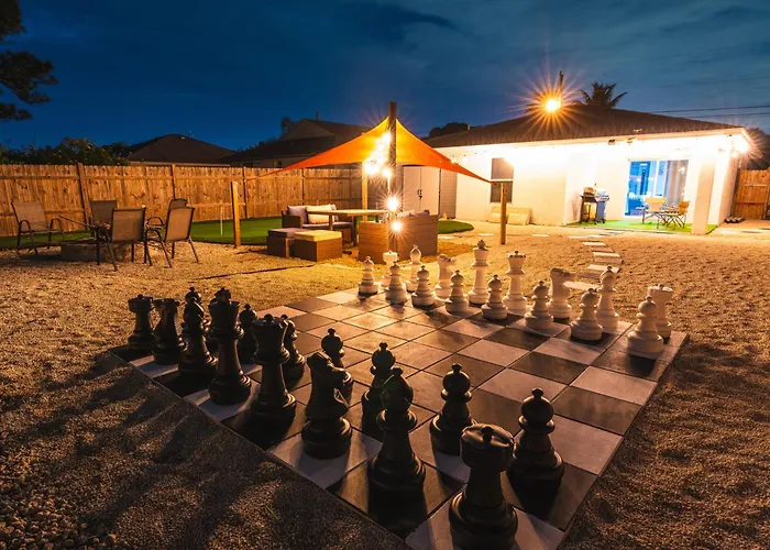 Golfers Paradise 4-Hole Putt-Putt, Mega Chess With Huge Backyard, Hammock