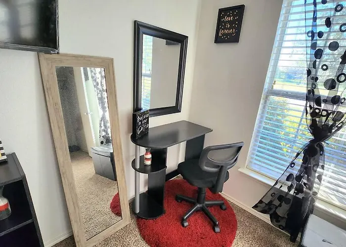 Comfortable Queen Bedroom With Workspace