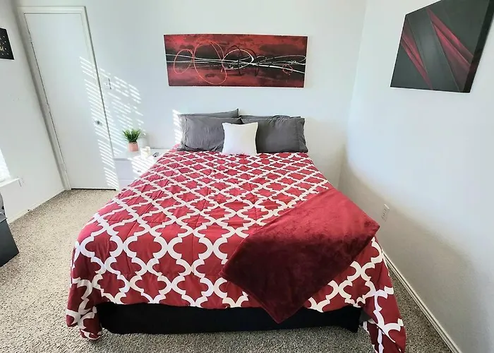 Comfortable Queen Bedroom With Workspace