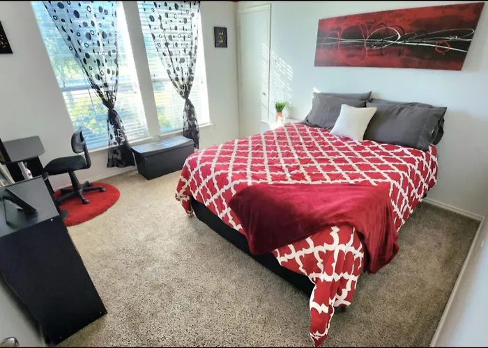 Comfortable Queen Bedroom With Workspace