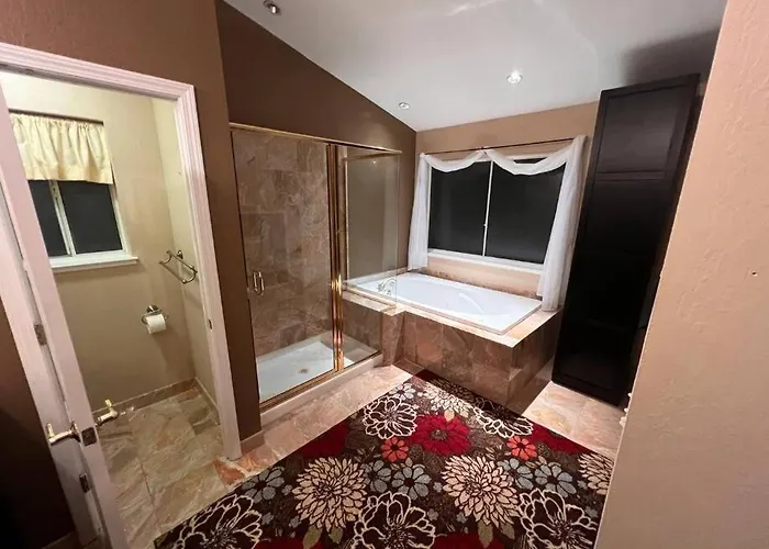 A Master Suite With Own Kitchenette And Bath
