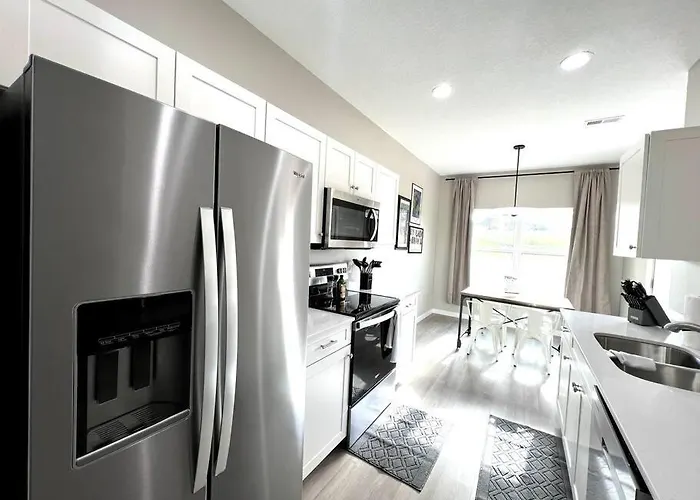 Central Cedar Falls Townhome - King Beds!