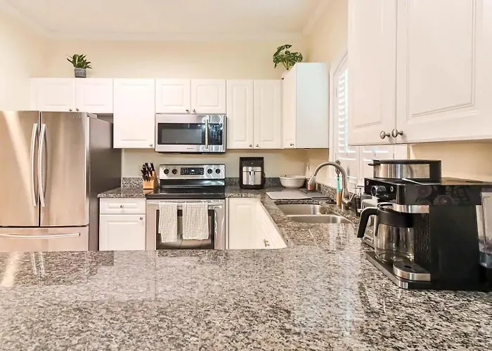 Beautiful 1500 S F 3 Bd - 2 Ba Condo Overlooking Stream And Golf Course