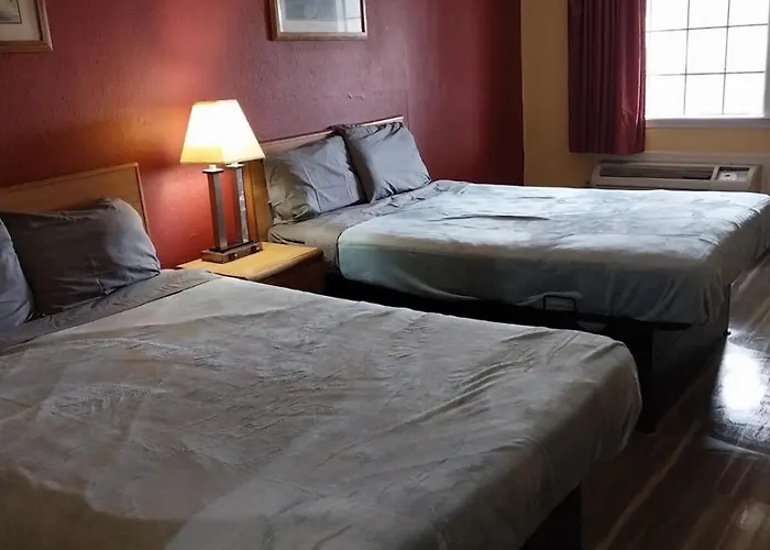 Gated 2 Double Beds Hotel Room 122