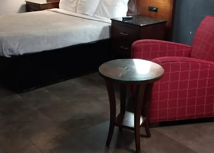 Queen Bed Hotel Suite 244