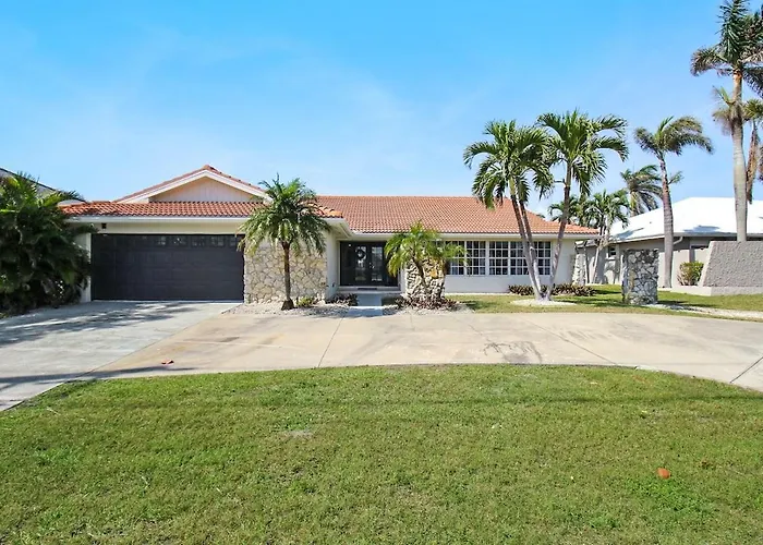 Chic & Modern Canal-Front Retreat With Private Pool - Azure Tides