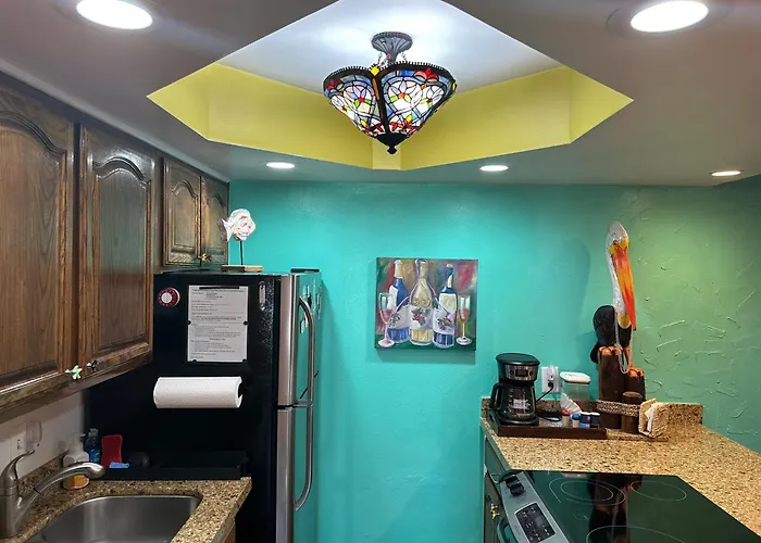 The Best Location! Tiki Ground Level Condo & Right On The Beach!