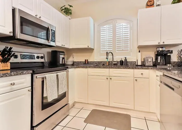 Beautiful 1500 S F 3 Bd - 2 Ba Condo Overlooking Stream And Golf Course