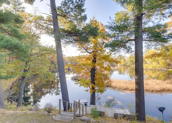 Antiquing & Fishing: Riverfront Waupaca Home!