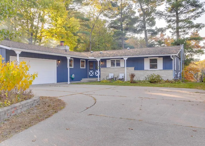 Antiquing & Fishing: Riverfront Waupaca Home!