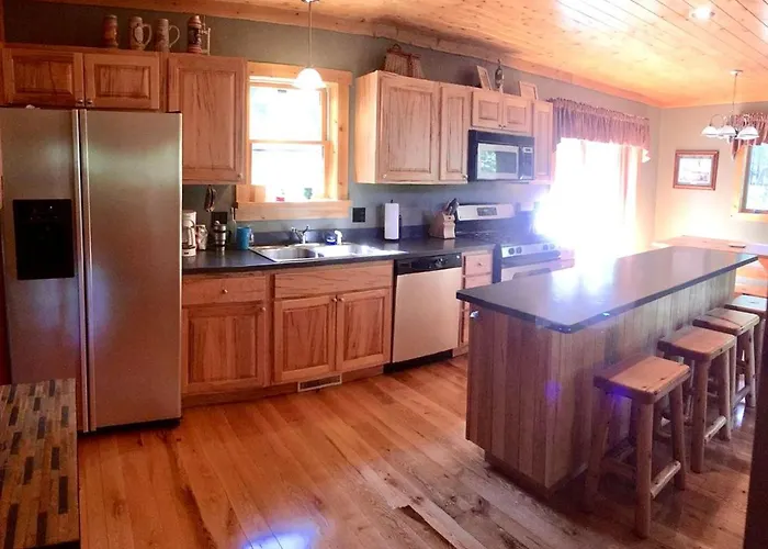 Cozy And Spacious Log Cabin Rental Near Burt Lake State Park In Michigan