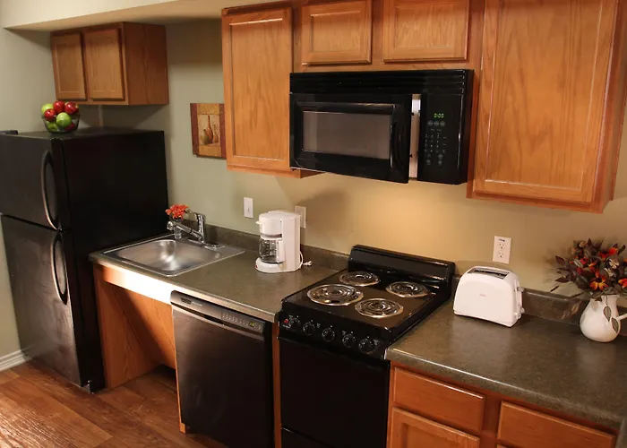 Eagle'S Den Suites Kenedy A Travelodge By Wyndham
