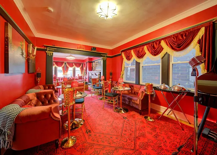 The Twin Lions: Bespoke Travel Lodge W/ Speakeasy*
