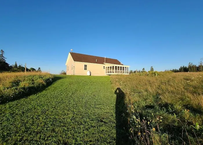 Tranquil Getaway On The Coast With Beach Access, Ocean Views, & Screened Porch