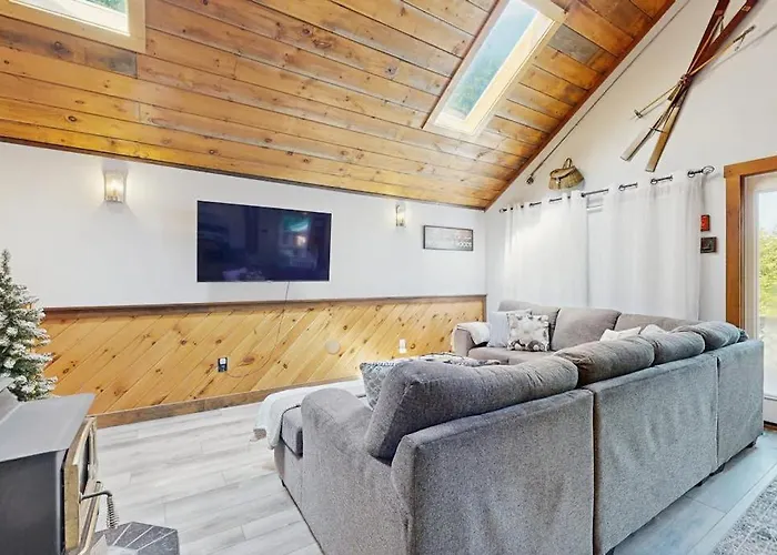 Scenic Retreat With A Spacious Deck, Gas Fireplace, And Moosehead Lake Views