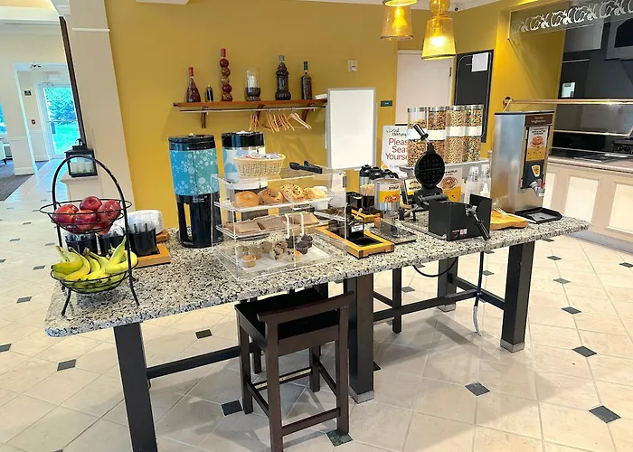 Arnot Grand Hotel & Suites