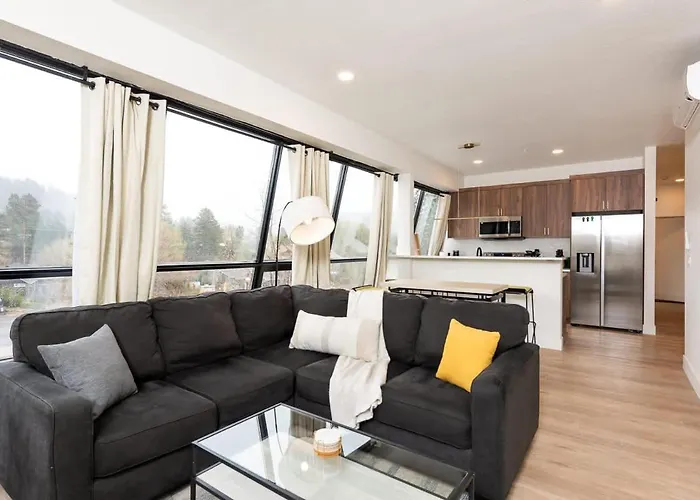 Modern Condo With Town And Mountain Views