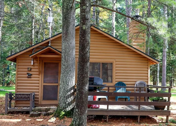 Secluded Rustic-Modern Cabin With Rock Fireplace & Pine-Surrounded Deck Near Babbitt, Minnesota