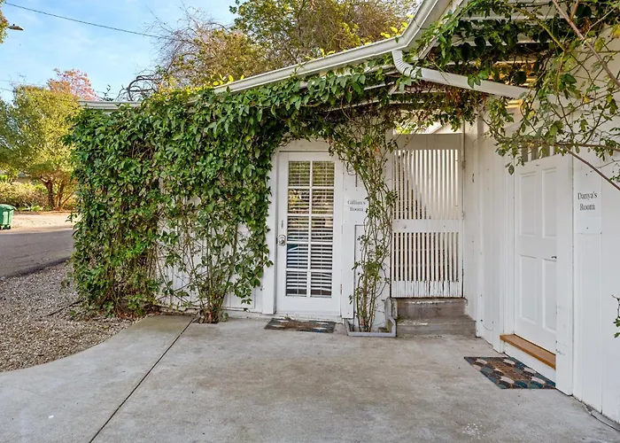 Vine-Covered Garden Suite | Queen + Patio