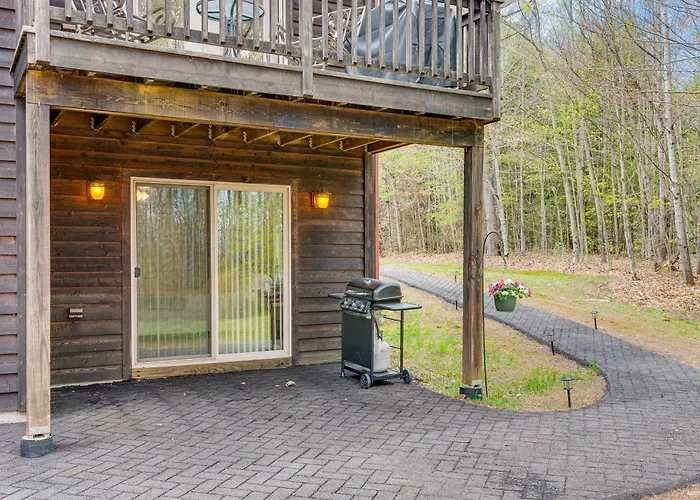 Fire Pit & Forest Views: Lakes Region Retreat