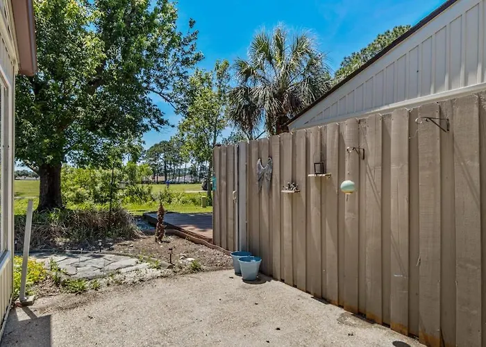 Dog Friendly Coastal Townhome With Golf Course Views Patios And Washer Dryer