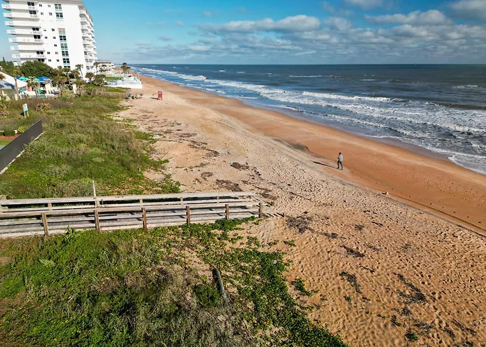 New Listing! Updated Oceanfront 2-2 With Private Balcony, Heated Pool, And Garage Parking